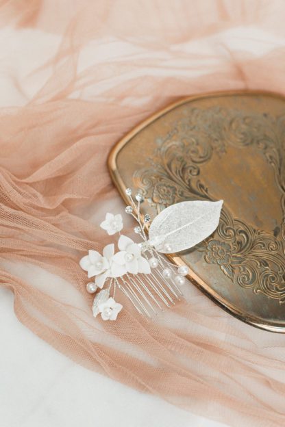 silver floral hair pin on bride updo
