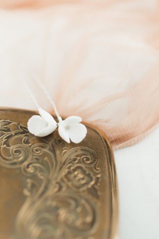 white porcelain floral hair pin