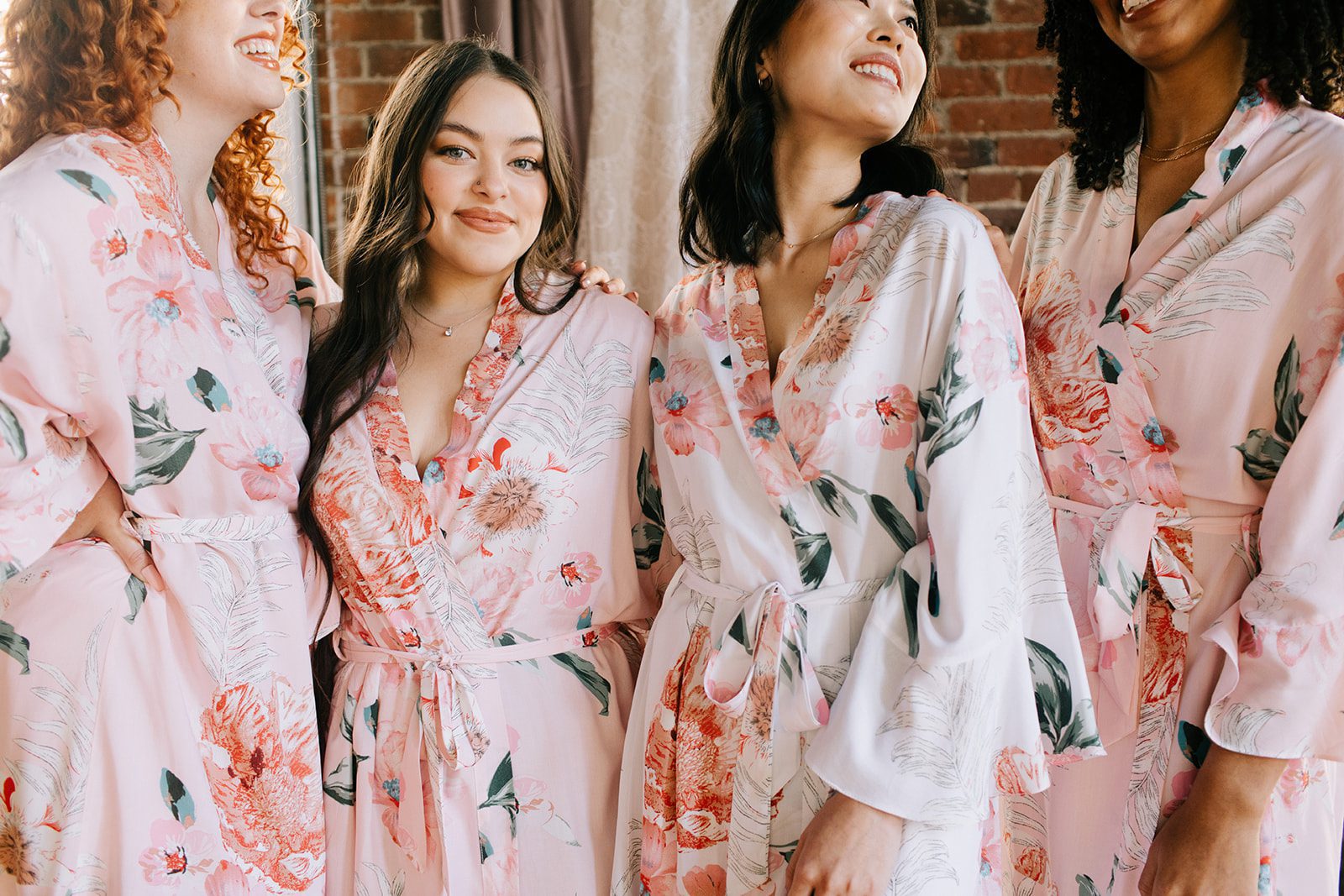 4 girls in satin bridal robes
