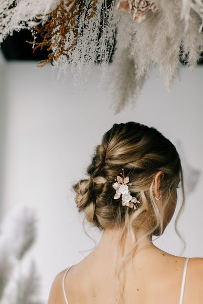 floral porcelain hair pin on model updo