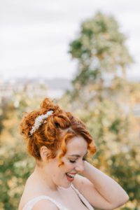 porcelain floral hair comb on bride updo