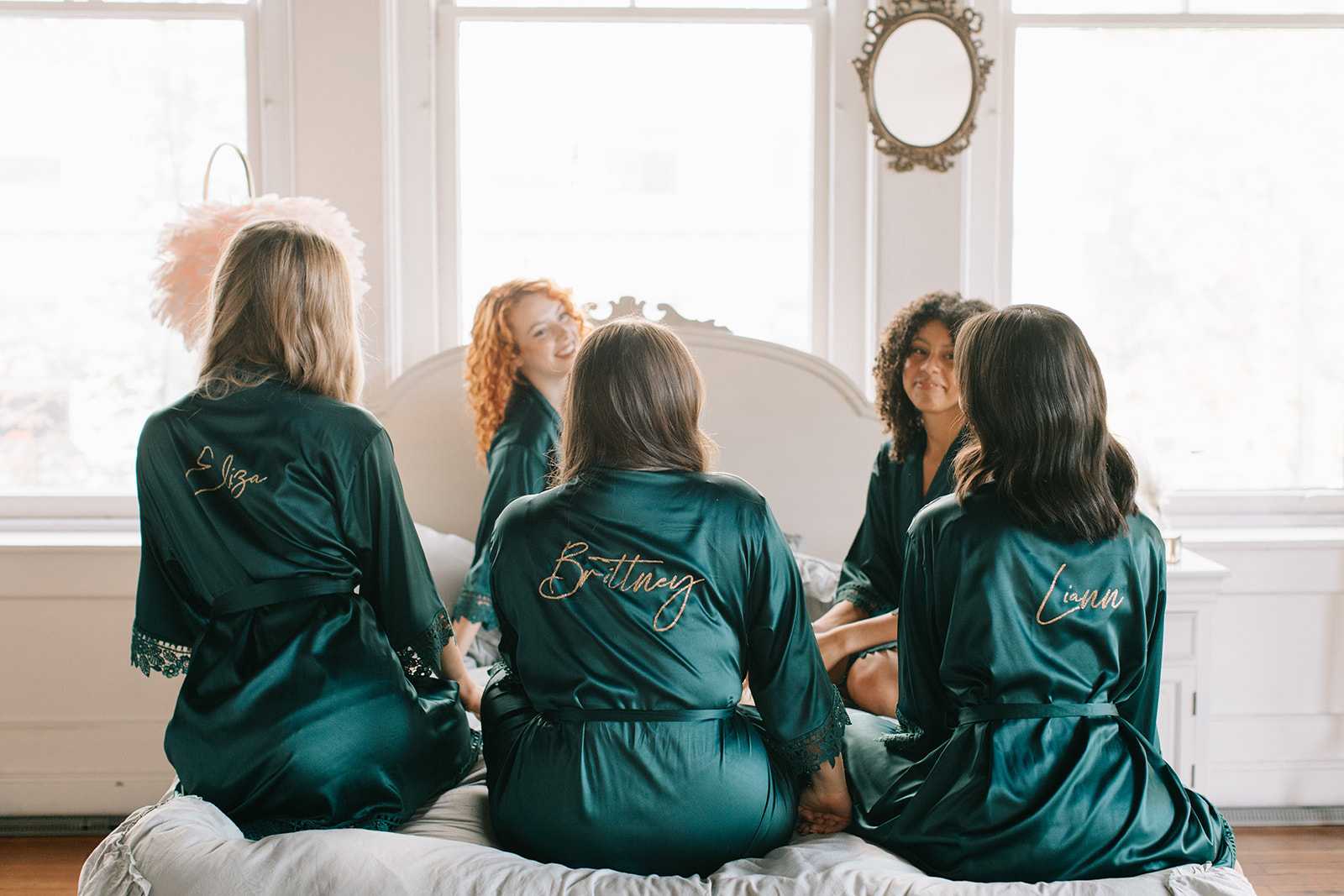 bridal party in customized lace bridal robes